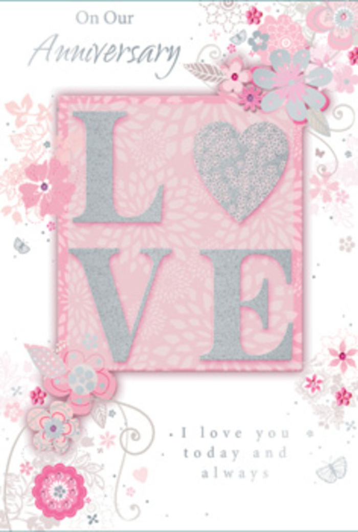 In this image, the anniversary card appears as a delicate artwork, with its design echoing the soft romance of hand-tied flowers carried home along New Cross Road. Dominating the centre is the word LOVE, printed in large, raised letters that create a strong tactile presence. The letters are coated in fine blush-pink and pearlescent glitter, with a few subtle silver flecks dancing across the surface, so the word seems to catch and hold the light. Beneath the raised texture, the background is a velvety blush pink that grows more intense near the middle and then fades gently toward the edges, evoking the soft heart of a newly opened rose. Curving over and around this central motif is an intricate pattern of stylised flowers and delicate foliage. The blooms are drawn in fine white and pale grey lines, some petals softly shaded to suggest depth, others merely indicated with minimal strokes, creating a sense of space and breath. The floral pattern winds and curls like the graceful stems in a florist's preliminary sketch, as if imagining a loose, romantic anniversary bouquet destined for a New Cross living room. Tiny accents of silver foil highlight certain petals and tendrils, scattering a refined sparkle across the design. Flowing script text delivers heartfelt anniversary sentiments above and below the floral centrepiece. The handwriting-style font is elegant and slightly curved, its soft grey colour harmonising with the overall palette of blush, white, and silver. The entire composition feels light, dreamy, and deeply affectionate-much like the feeling of opening the door to find a pastel arrangement waiting, freshly delivered, to mark years of shared memories in New Cross.